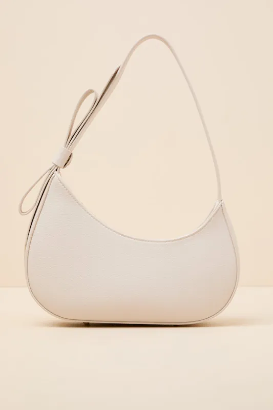 Teyana Bone Pebbled Vegan Leather Bow Shoulder Bag sold by Lulus