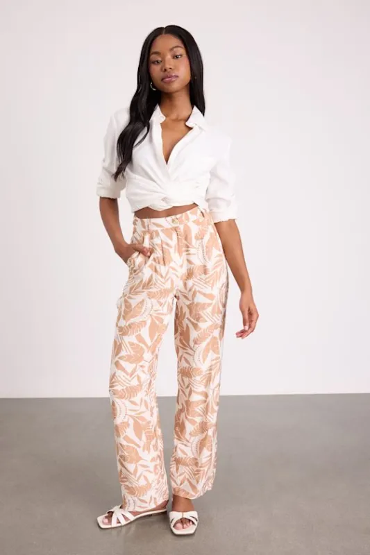 Dominica Ivory and Tan Tropical Print Wide-Leg Pants sold by Lulus