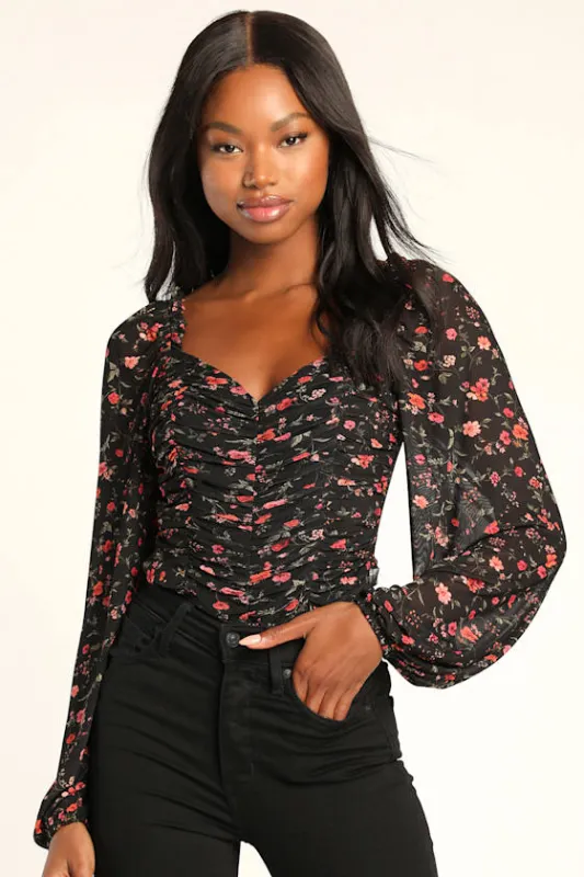 Blooming with Bliss Black Floral Ruched Long Sleeve Bodysuit sold by Lulus