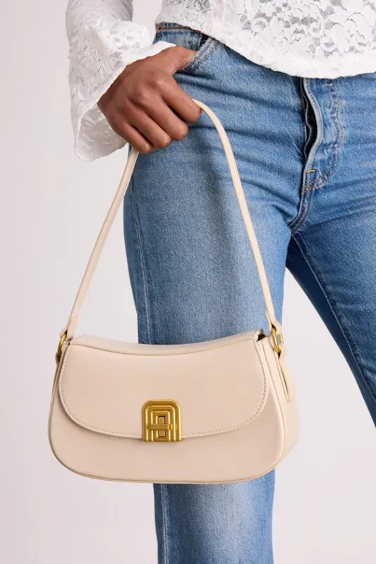 Picturesque Charm Bone Faux Leather Shoulder Bag sold by Lulus