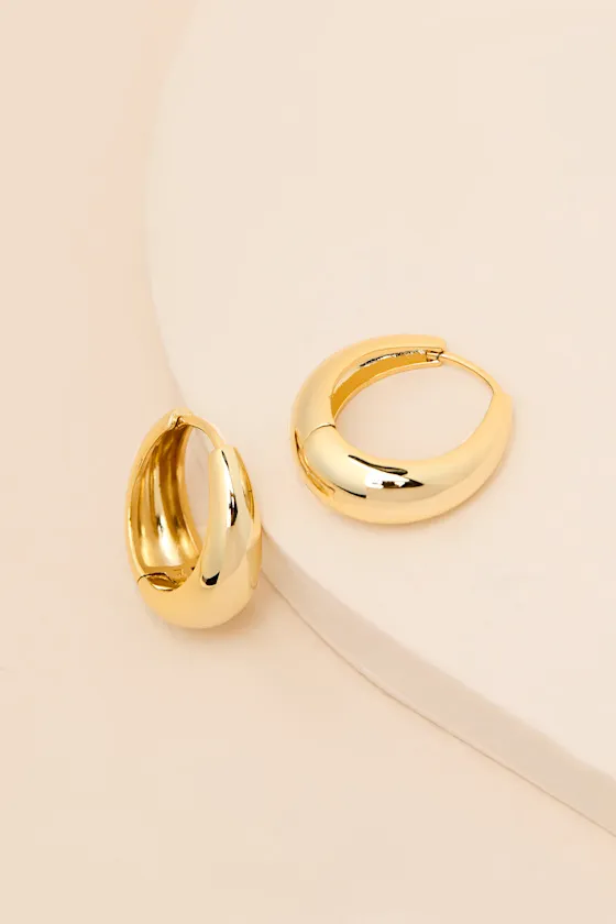 The Marabella Gold Chunky Hoop Earrings sold by Lulus