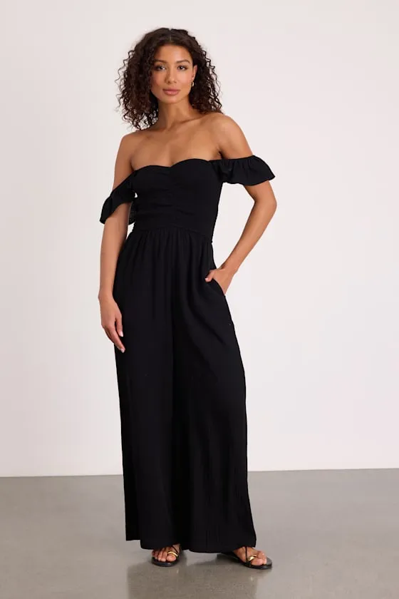 Daniyah Black Smocked Flutter Sleeve Wide-Leg Jumpsuit sold by Lulus