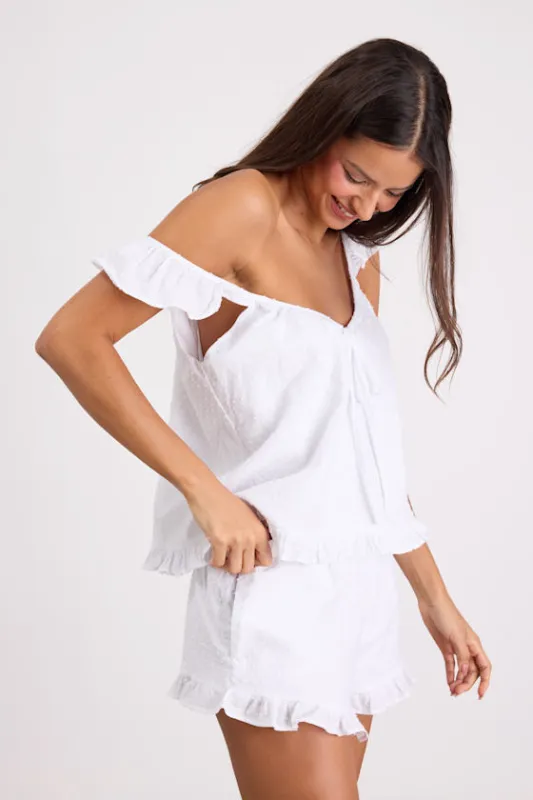 Janelly Ivory Swiss Dot Ruffled Two-Piece Pajama Set made by Lulus