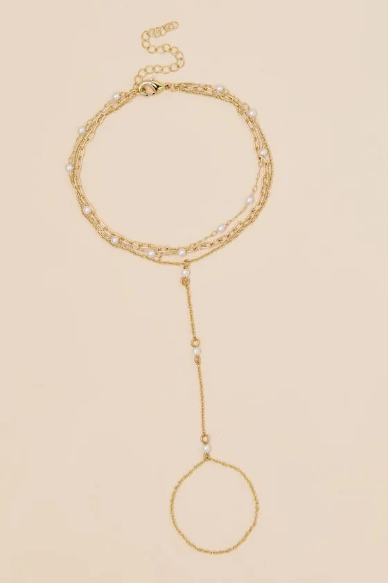Adalee Gold Pearl Hand Chain Bracelet sold by Lulus product image thumbnail 2