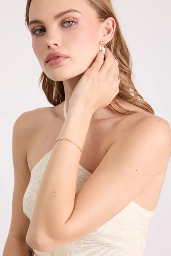 Adalee Gold Pearl Hand Chain Bracelet sold by Lulus product image thumbnail 3