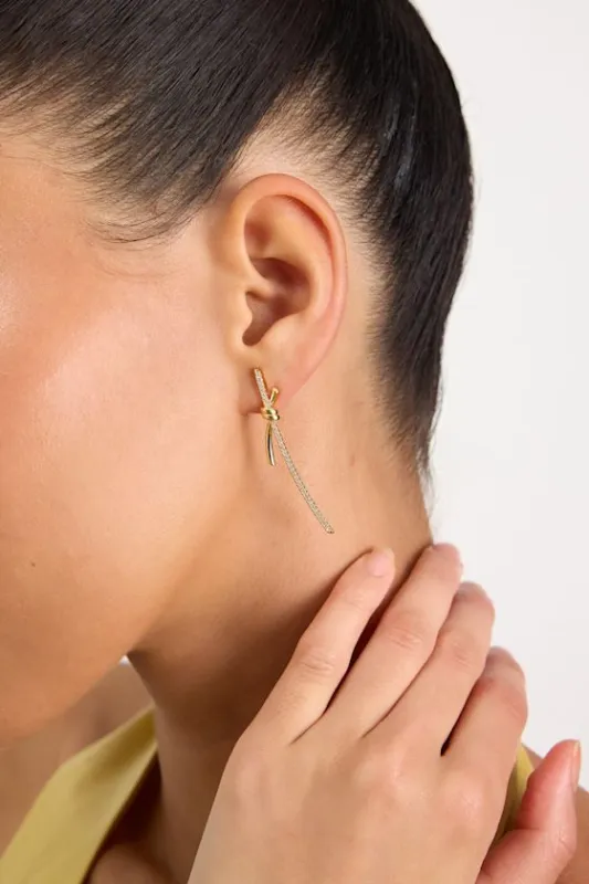 Susanna 14KT Gold Knotted Rhinestone Drop Earrings made by Lulus