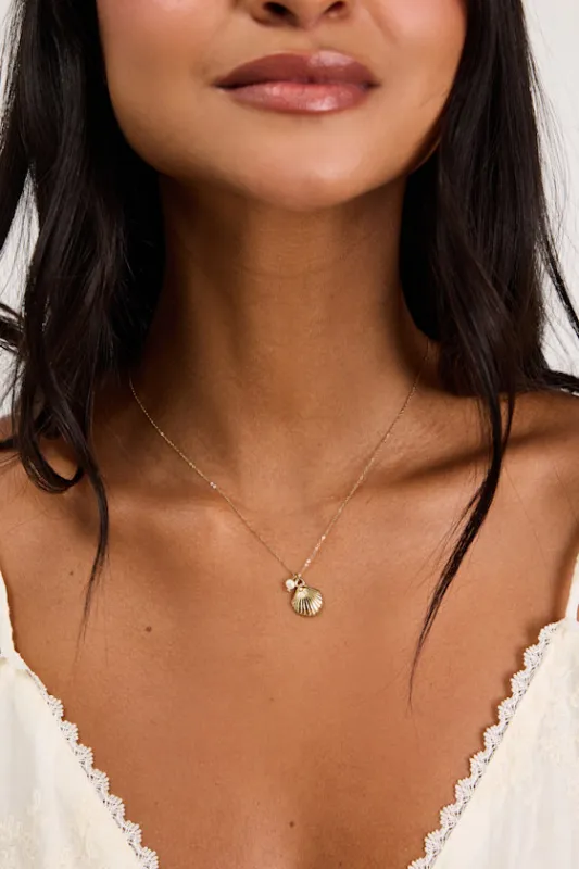 Quinlynn Gold Seashell Pendant Necklace made by Lulus