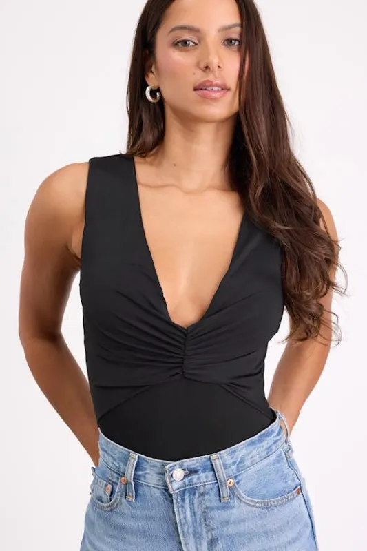 Balyn Black Slinky Knit Cutout Bodysuit made by Lulus