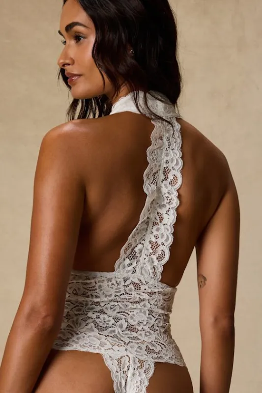 Lara Ivory Sheer Lace Halter Bodysuit made by Lulus