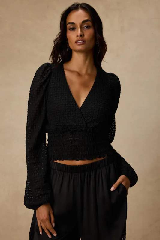 Shadia Black Textured Surplice Smocked Top made by Lulus