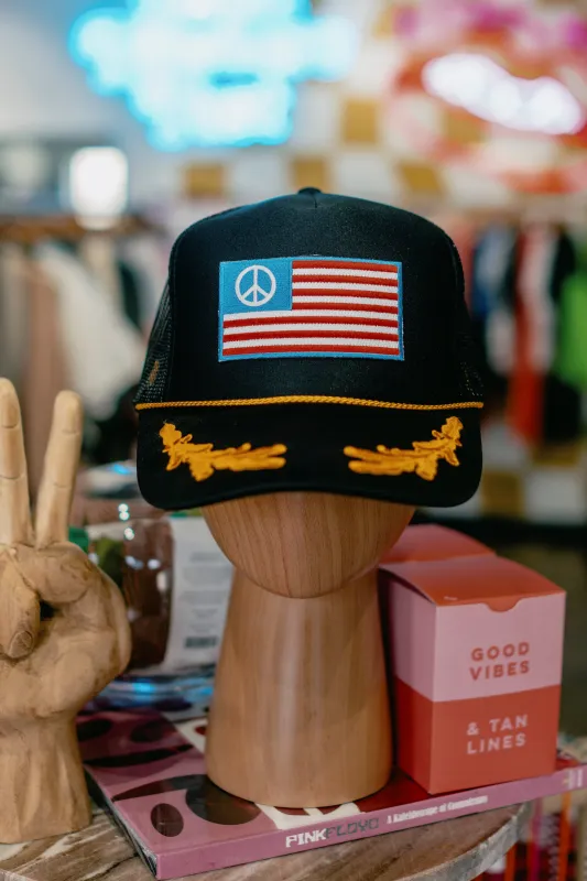 Peace Flag Trucker sold by Ascot + Hart