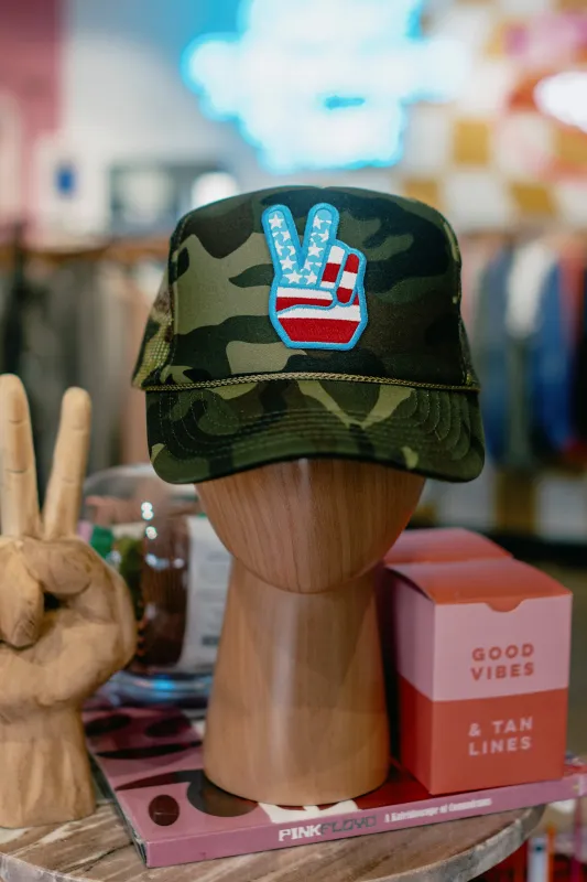 Camo Peace Trucker sold by Ascot + Hart