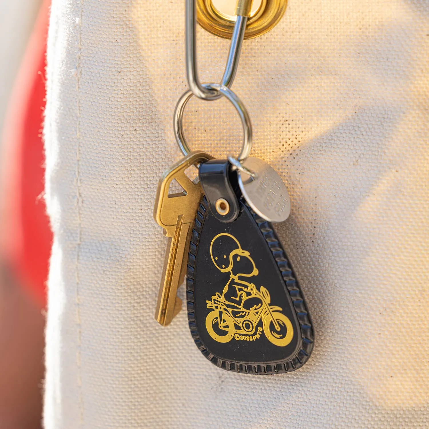 3P4 x Peanuts® - Snoopy Motorcycle Saddle Keychain sold by Ascot + Hart product image thumbnail 4