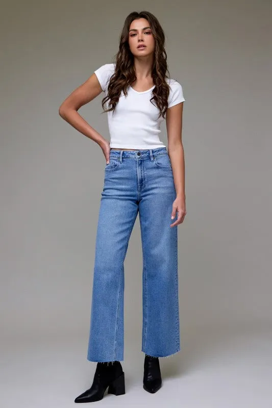 Logan High Rise Dad Jean lt Wash sold by Kins Collective