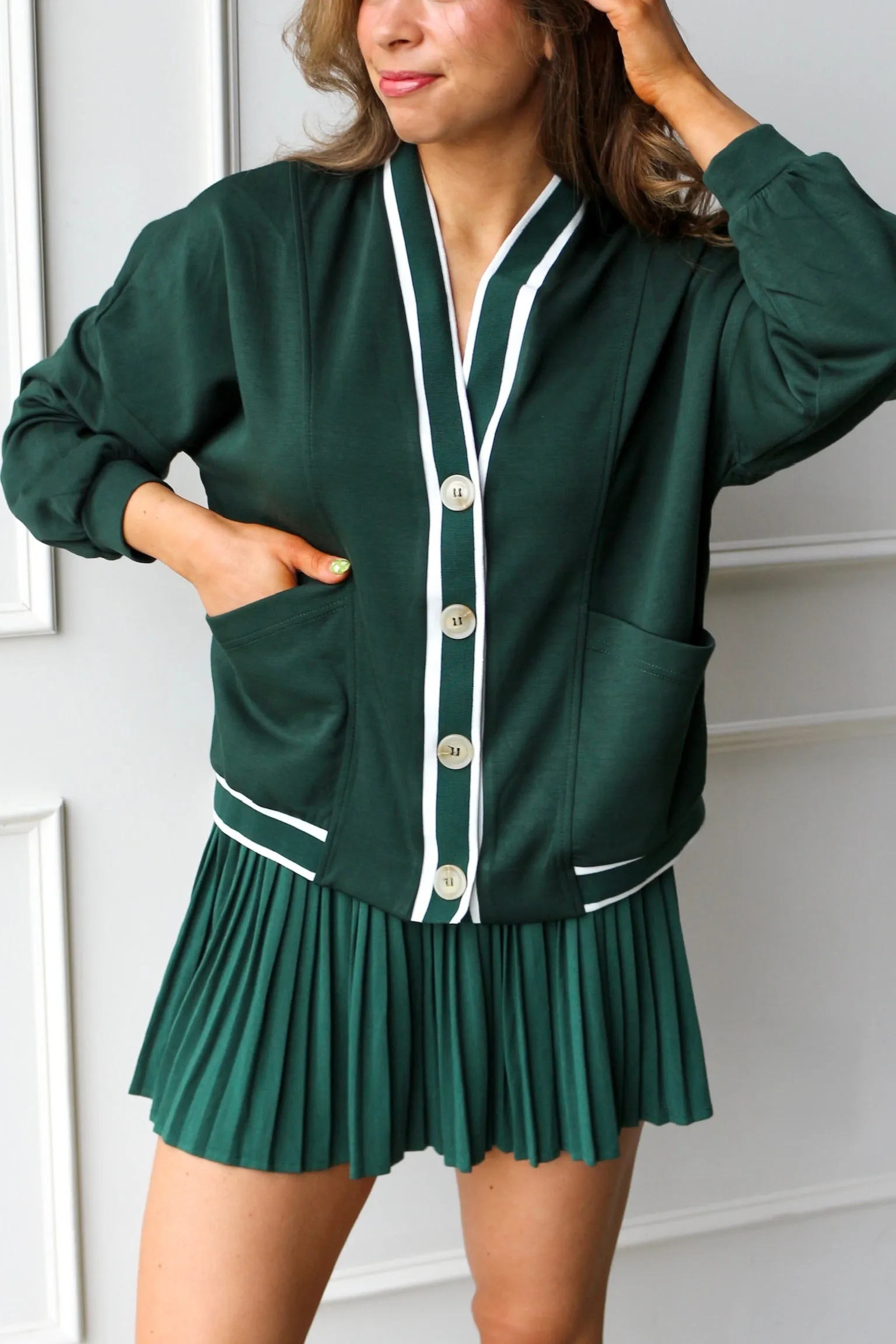 Tee Time Cardi sold by Kins Collective