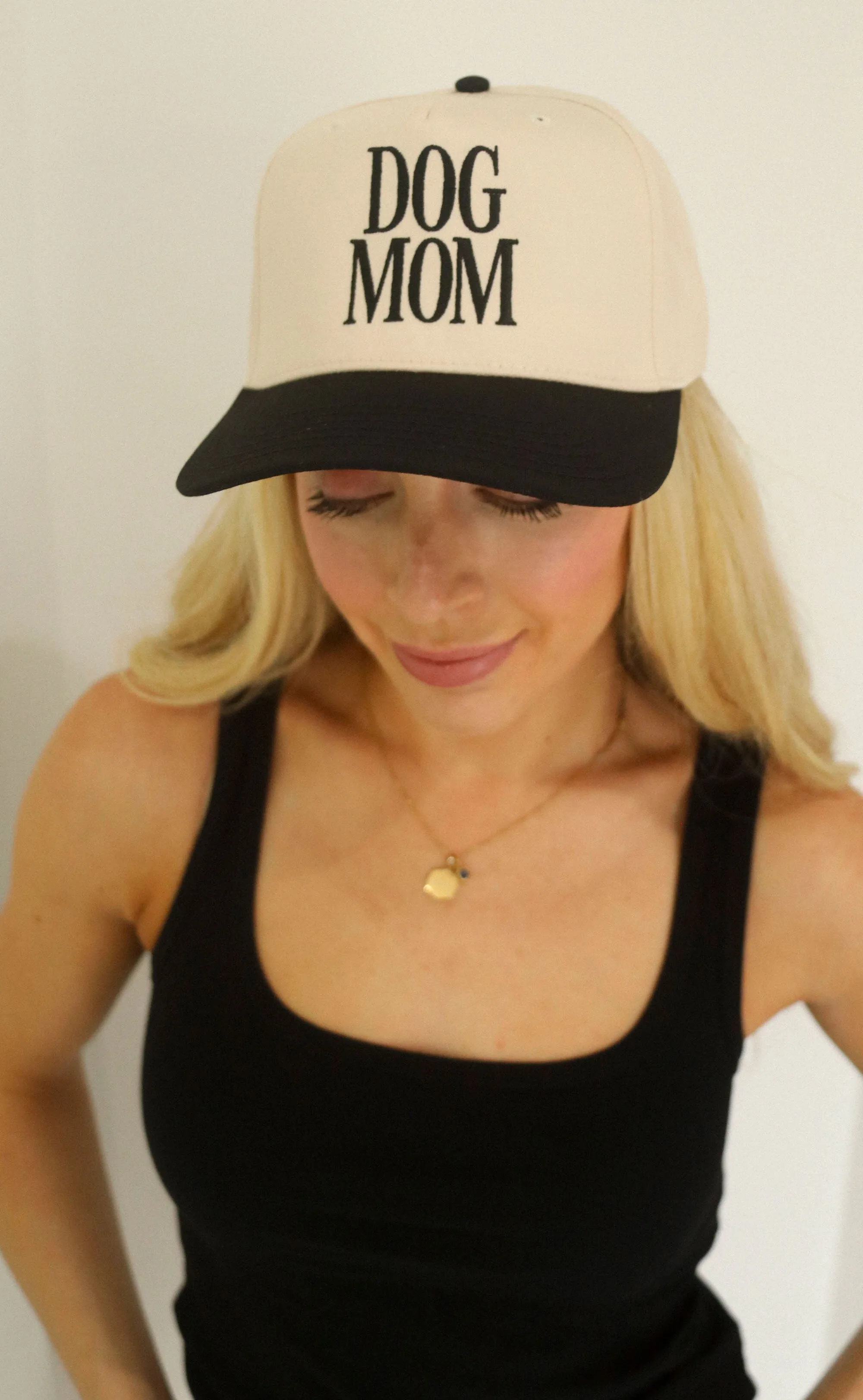 friday + saturday: dog mom trucker sold by RIFFRAFF