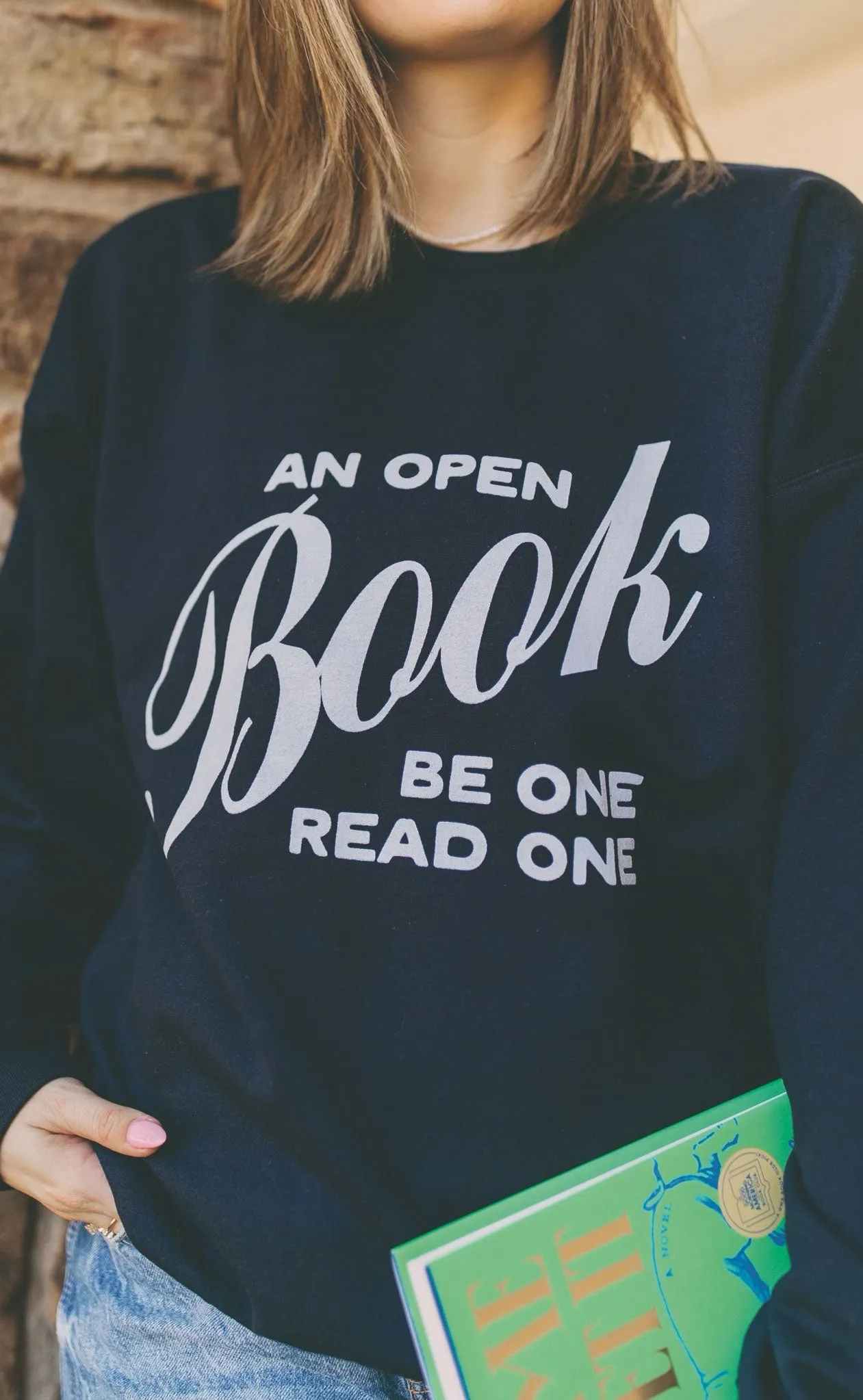 friday + saturday x jo johnson overby: open book sweatshirt sold by RIFFRAFF