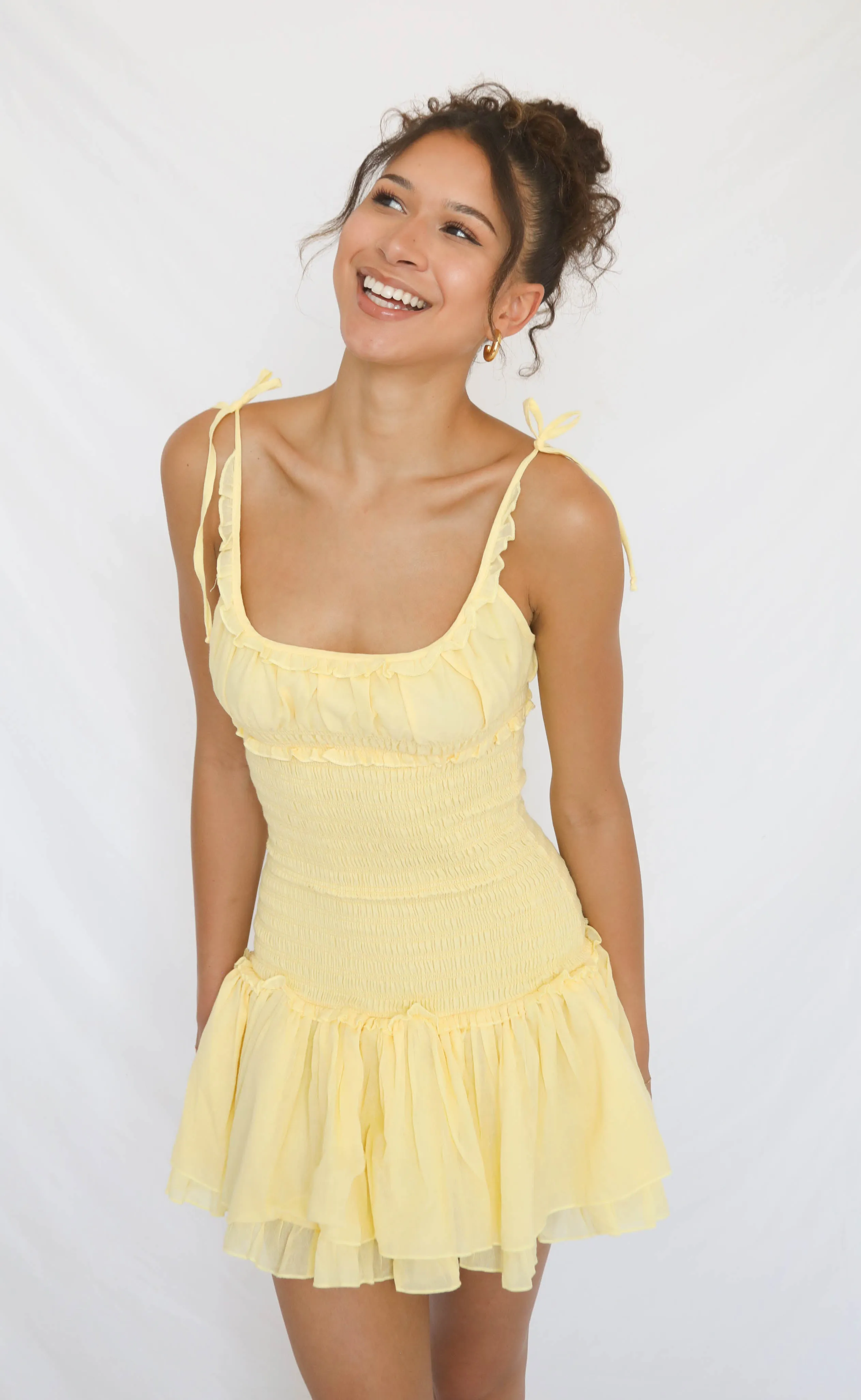 lemon drop ruffle mini dress sold by RIFFRAFF