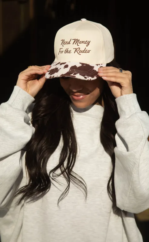 charlie southern: need money for the rodeo cowprint trucker sold by RIFFRAFF