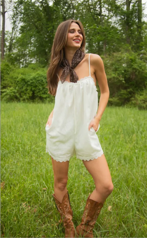 this is the moment lace trim romper made by Le Lis