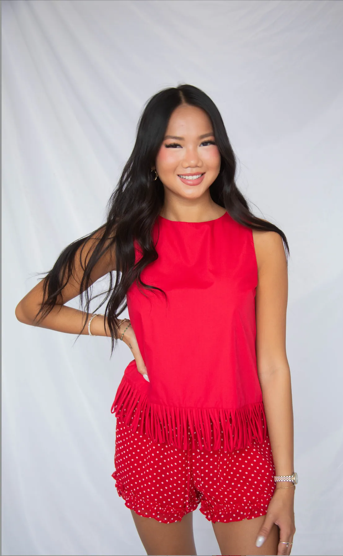 on the other side fringe hem top sold by RIFFRAFF