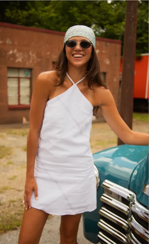 in the lines halter mini dress made by Crescent