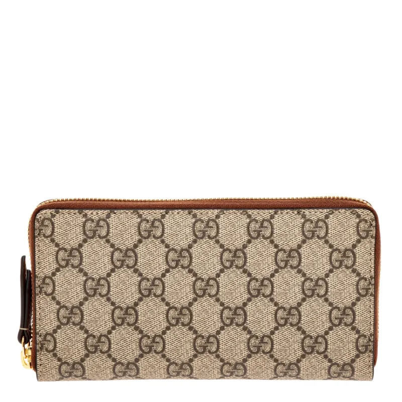 Gucci GG Supreme Zip Top Continental Wallet sold by Overstock