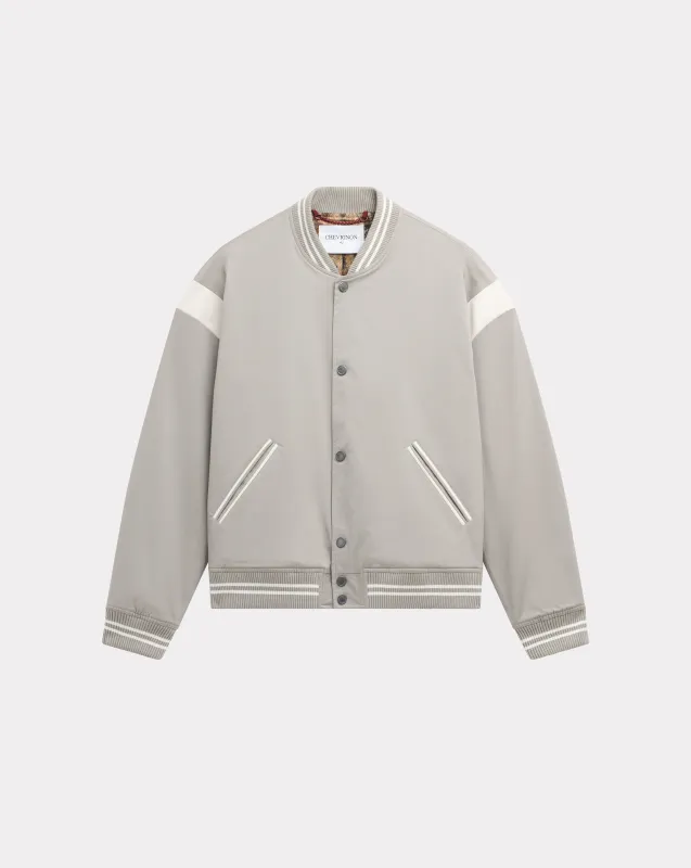BLOUSON VARSITY GRIS made by Chevignon