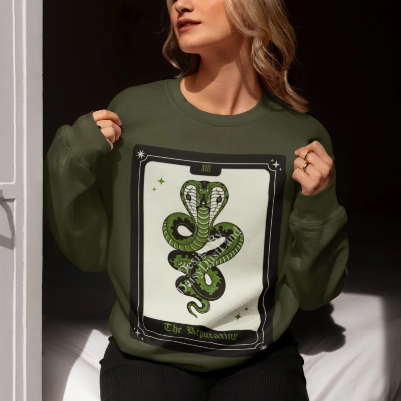 The Reputation Tarot Card Style Snake Crewneck sold by DaisyDustLand