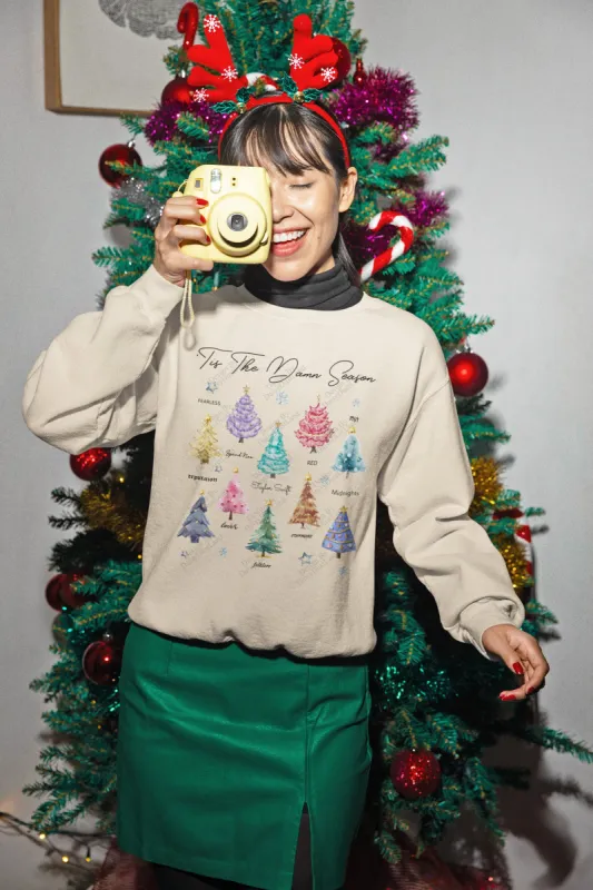 The 10 Era Colorful Christmas Trees Watercolor Graphic Sweatshirt sold by DaisyDustLand