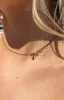Brylee Gold Bowknot Pendant Necklace sold by Beginning Boutique