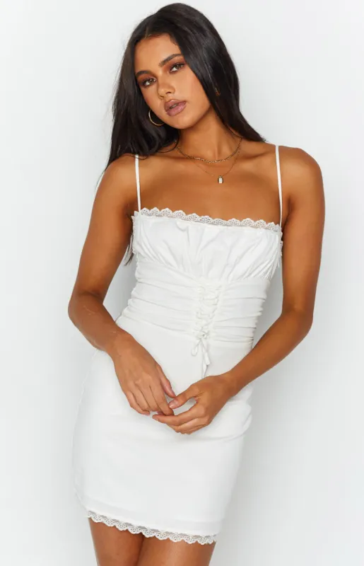 Daisy White Mini Dress sold by Beginning Boutique