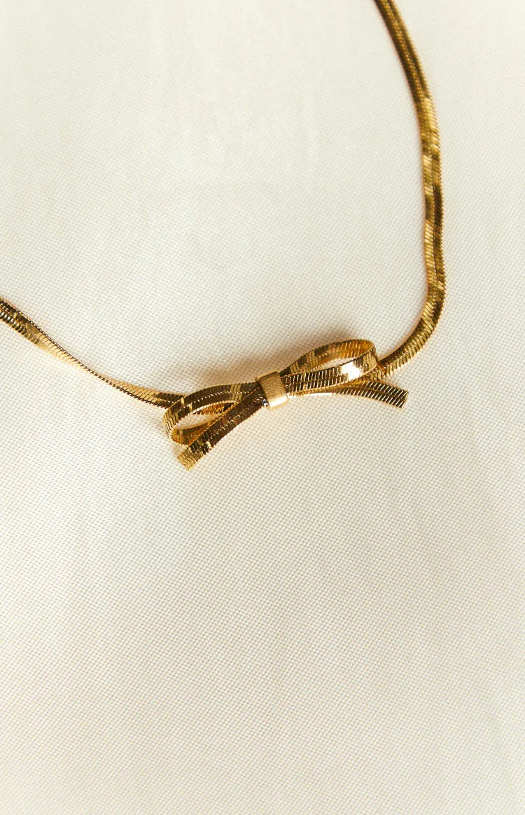 Brylee Gold Bowknot Pendant Necklace sold by Beginning Boutique product image thumbnail 4