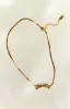 Brylee Gold Bowknot Pendant Necklace sold by Beginning Boutique