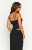 The Moment Black Cami Top sold by Beginning Boutique