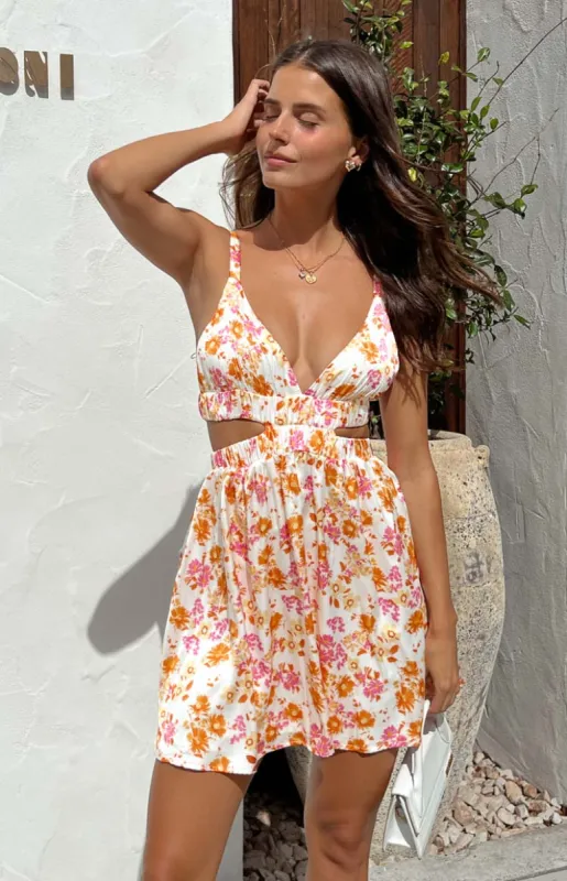 Juliette Orange Floral Mini Dress sold by Beginning Boutique