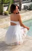 Amba White Strapless Mini Dress sold by Beginning Boutique