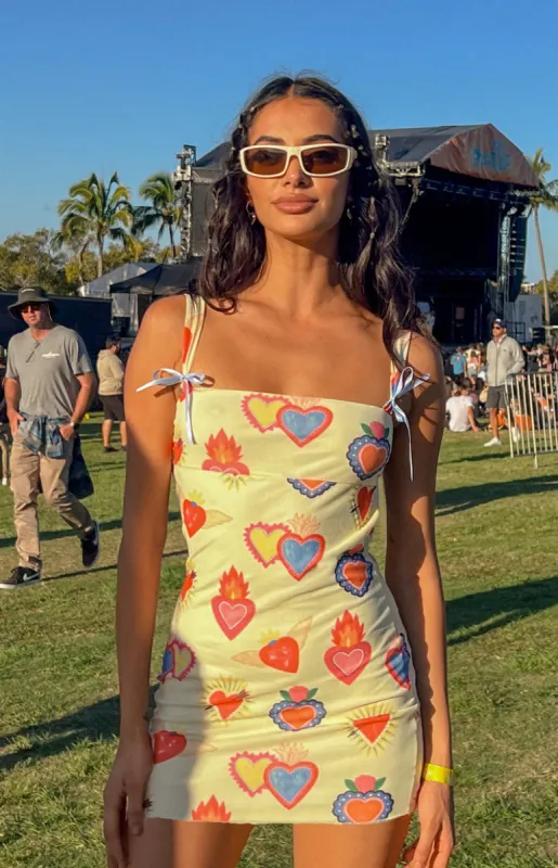 Romeo Yellow Print Mini Dress sold by Beginning Boutique