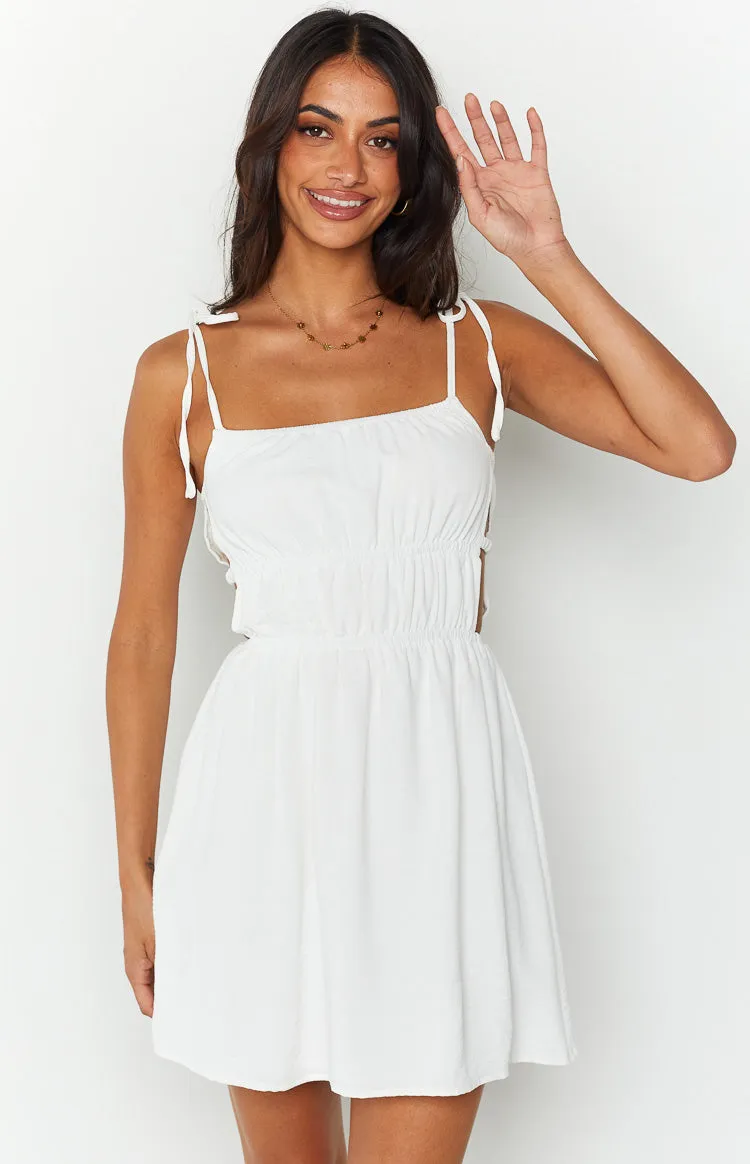 Eden White Cut Out Mini Dress sold by Beginning Boutique