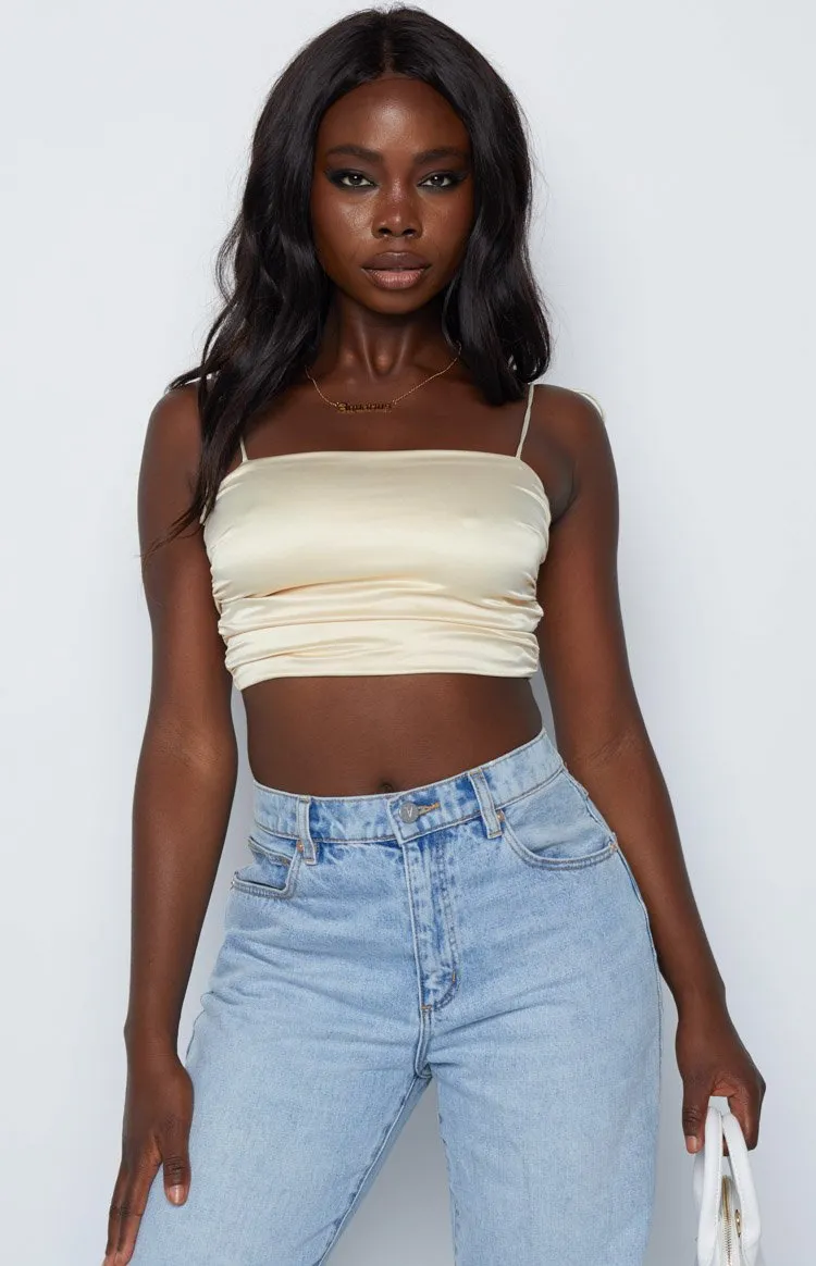 Wonderlust Champagne Satin Cami sold by Beginning Boutique