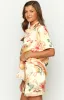 Noir Golden Escape Yellow Print MIni Skirt sold by Beginning Boutique