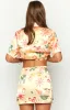 Noir Golden Escape Yellow Print MIni Skirt sold by Beginning Boutique