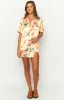 Noir Golden Escape Yellow Print MIni Skirt sold by Beginning Boutique