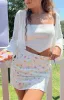Kierra White Floral Mini Skirt sold by Beginning Boutique