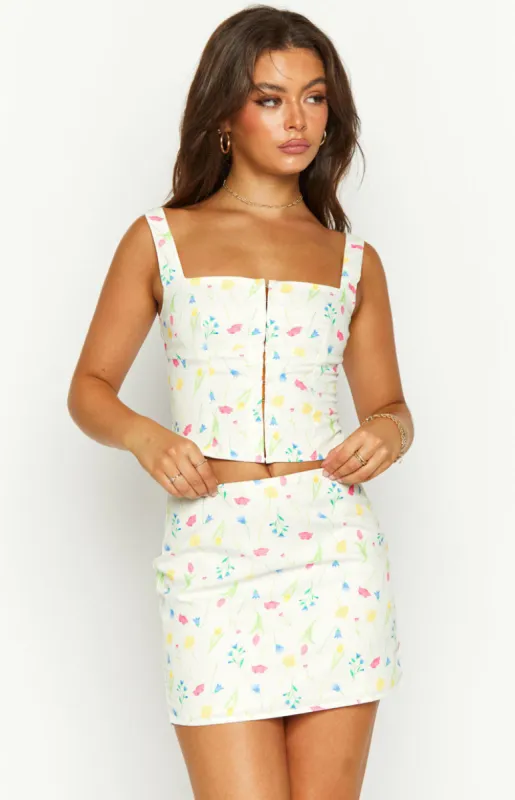 Kierra White Floral Mini Skirt sold by Beginning Boutique