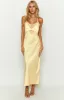 Elery Light Yellow Midi Dress sold by Beginning Boutique