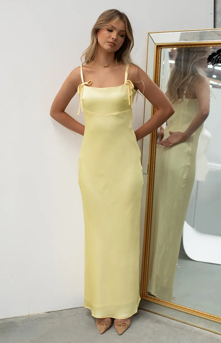 Zya Yellow Satin Maxi Dress sold by Beginning Boutique