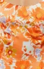 Rihanna Orange Floral Mini Dress sold by Beginning Boutique