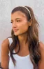 The Holly Cream Headband sold by Beginning Boutique