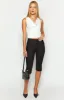 Tyrin White Crop Top sold by Beginning Boutique